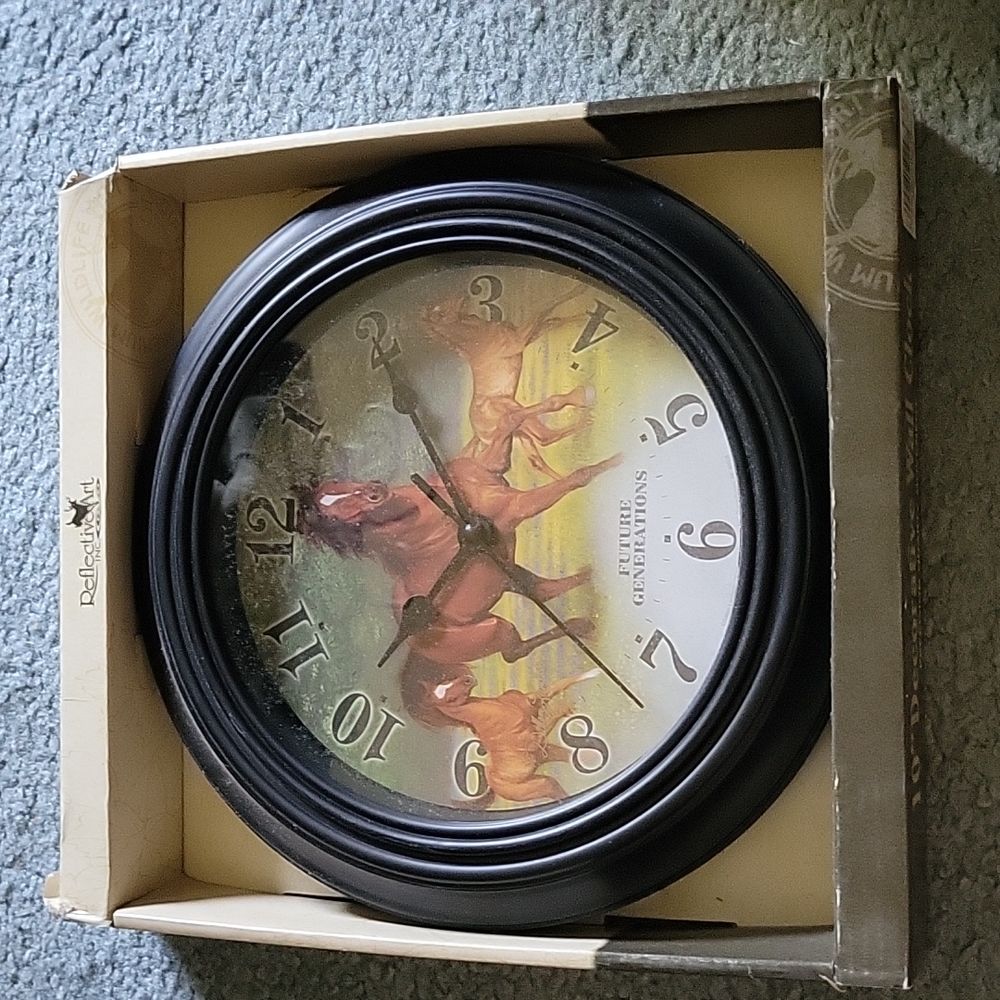 Decorative wall clock with horse print. New